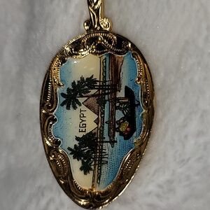 Egypt Souvenir Spoon gold tone enameled pyramid Nile scene.